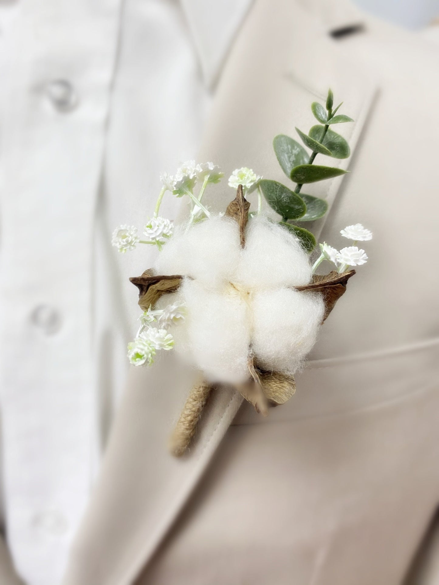 Cotton Blossom Boutonniere with Frosted Baby's Breath and Eucalyptus